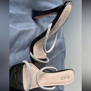 Radi- Shimmer and Black strap heels. (Worn once).